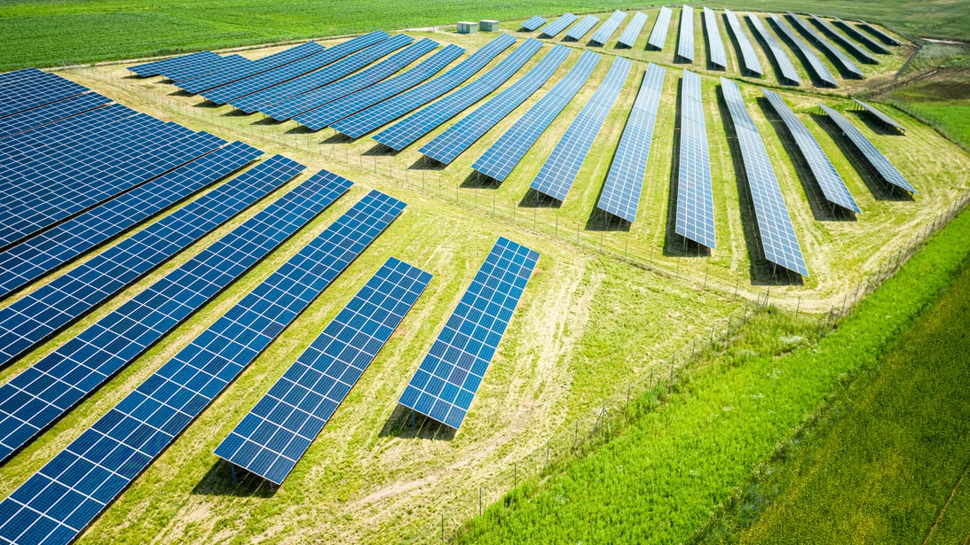 Solar panels on green field. Photovoltaic farm in Poland